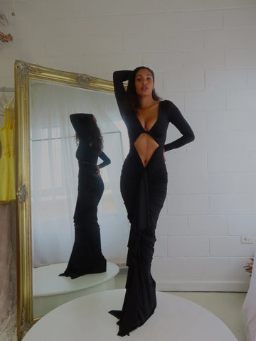 Beautiful model wearing Edano Long Sleeve Gown HIRE (Black), by Amy Taylor Collection. Contact us today to order your perfect outfit. 1